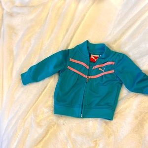 Puma baby track jacket in teal with pink stripes. Size 12M.